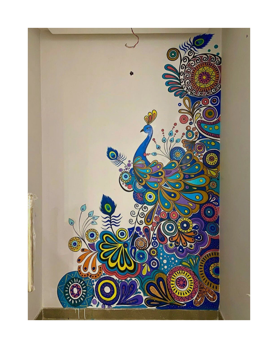 peacock design for wall mural done by oikar studio , the best company in kolkata, on modern design colourful and vibrant
