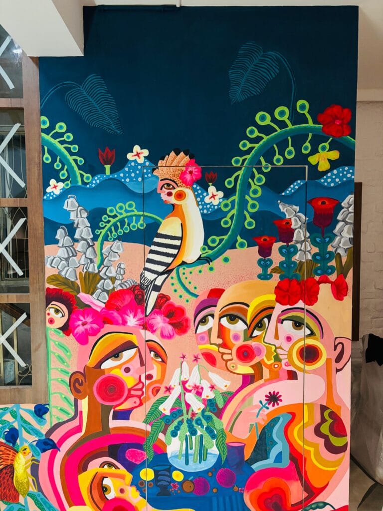 Custom café wall mural by Oikar Studio inside Country House Café Salt Lake, painted by an experienced mural artist in Kolkata