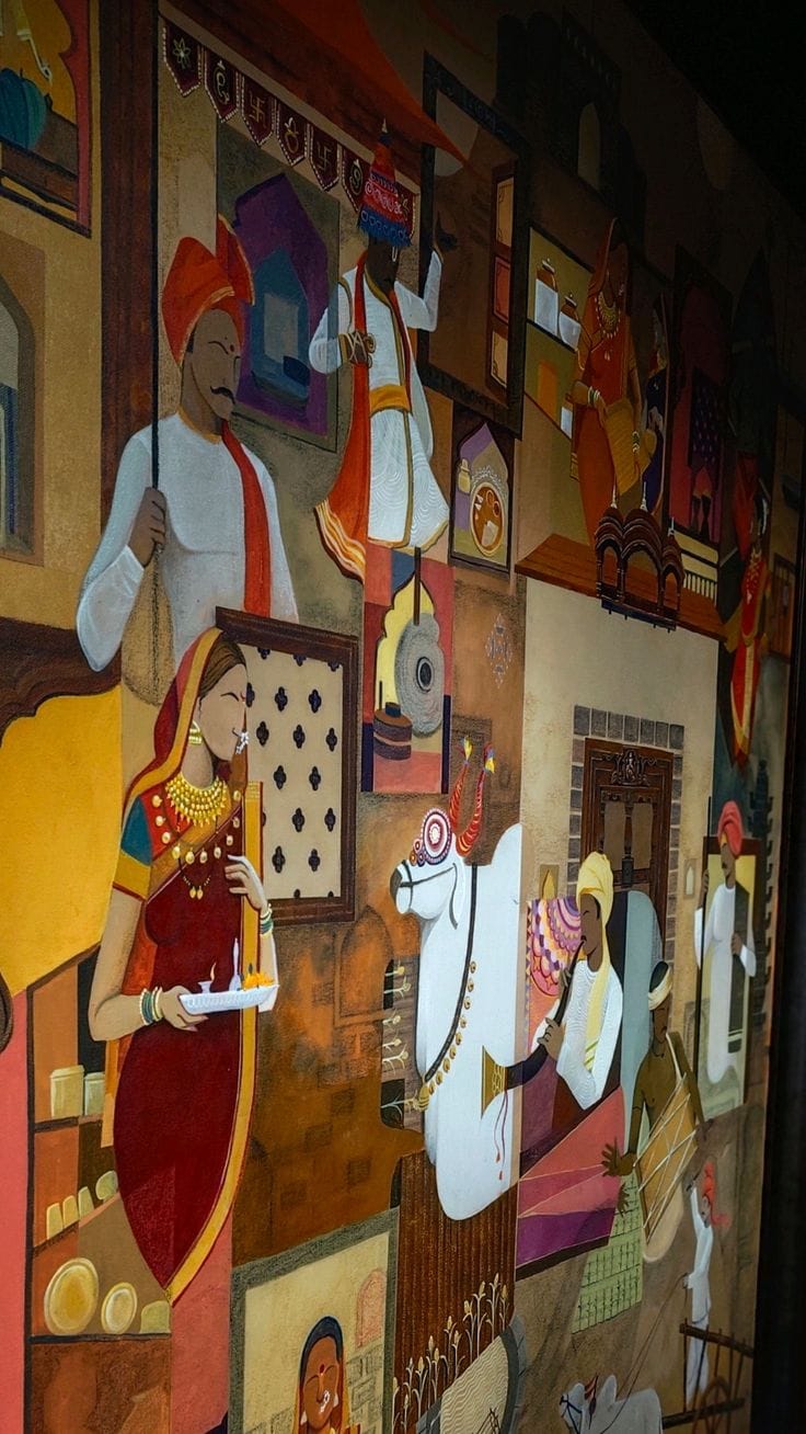 Traditional Indian cultural wall mural painting showing village life and folk musicians